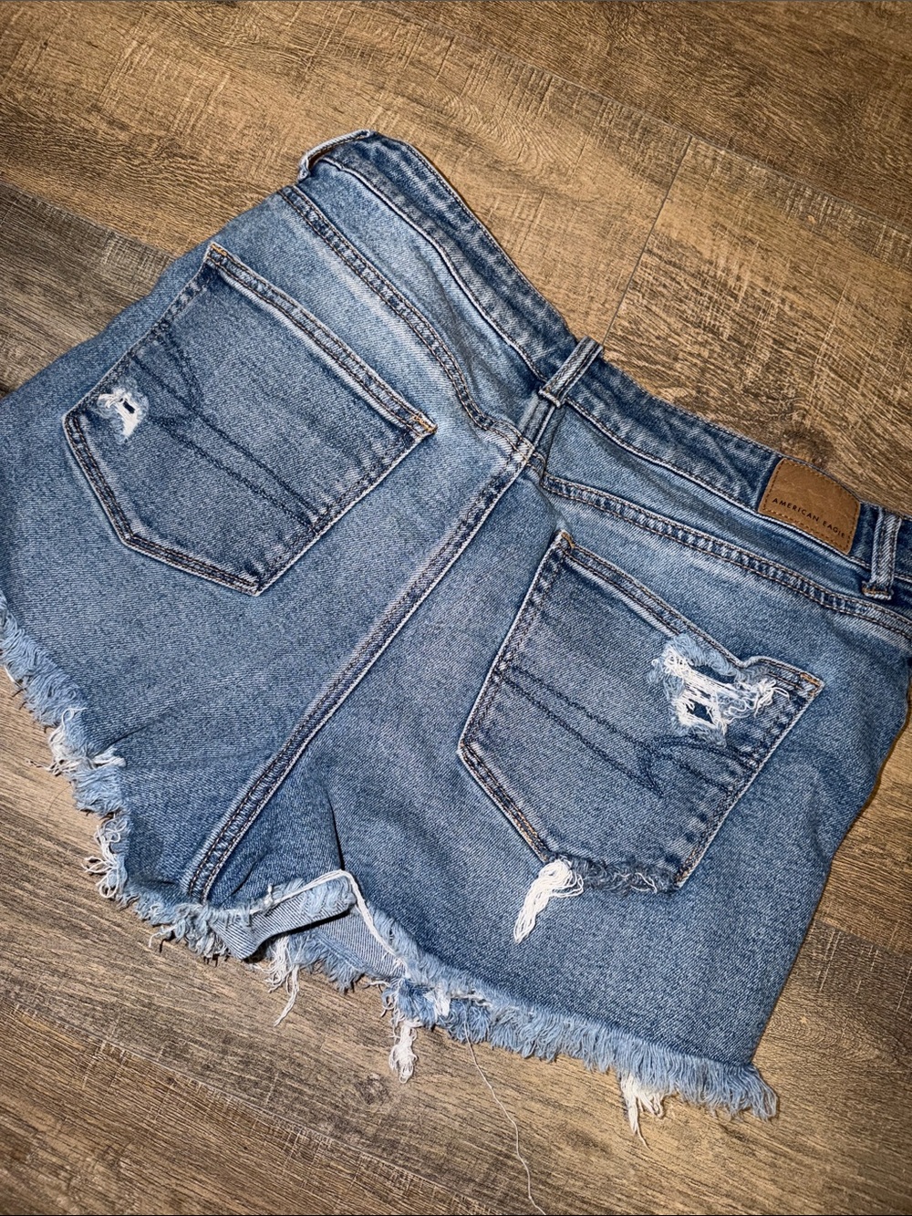 AE Distressed Medium Blue High-Rise Denim Cutoff Shorts - Picture 3 of 3